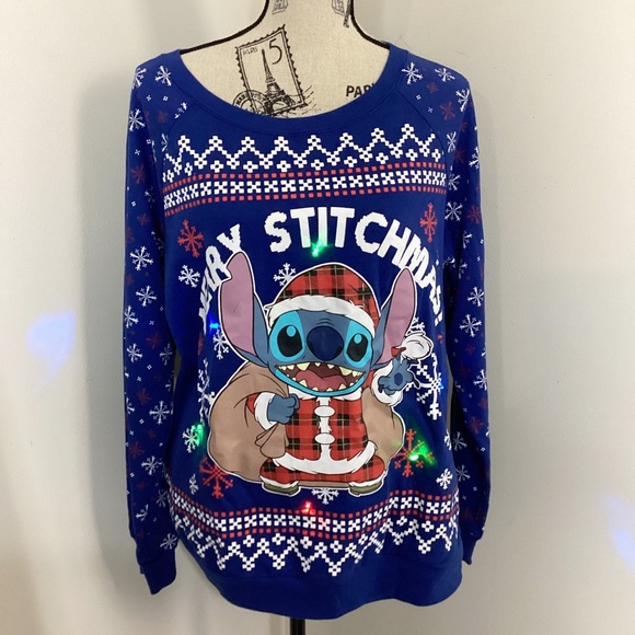 Disney Women’s Blue Holiday Sweater With Blinking Lights on Stitch & Snowflakes - Picture 1 of 5